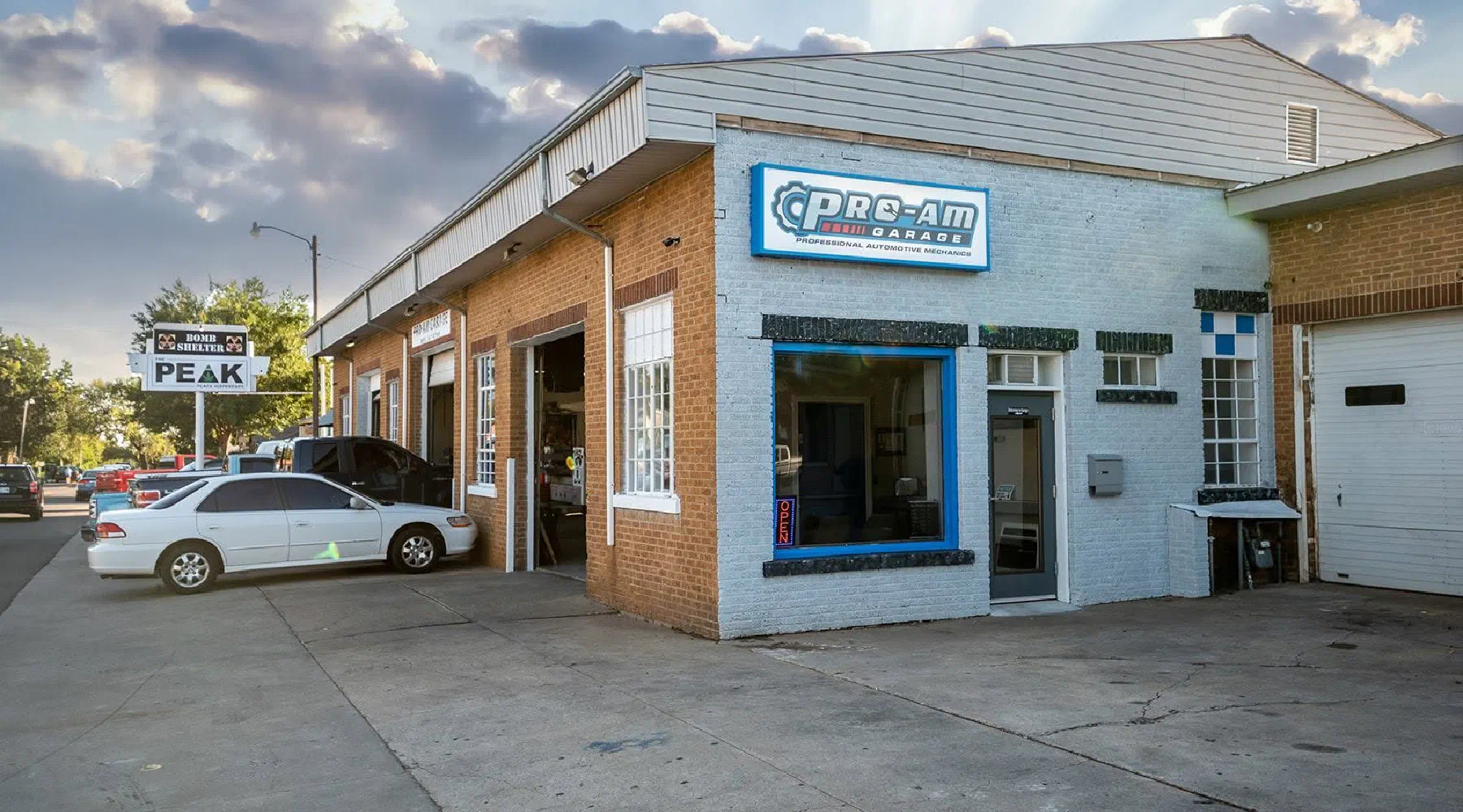 The Pro-AM Garage shop on NW 16th Street at sunset